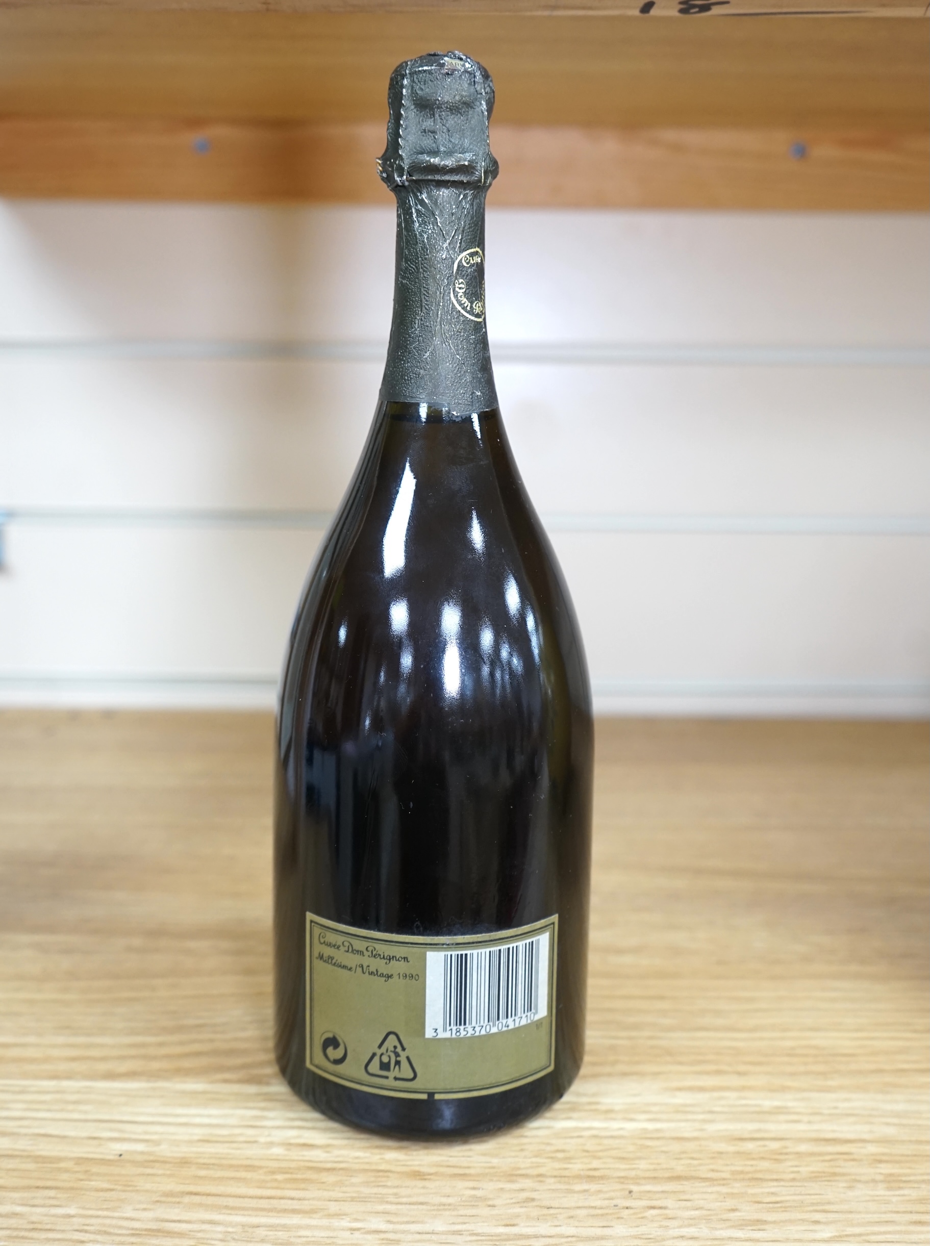 A bottle of Dom Pérignon, vintage 1990. Condition - storage unknown